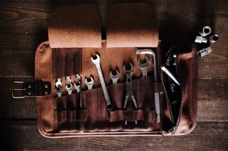 Hand-Crafted Leather Tools Roll Bag with 11 Slots and a Metal Buckle