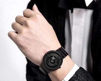 Tactile Minimal Rotating Magnetic Ball Watch Crafted from Recycled Metal