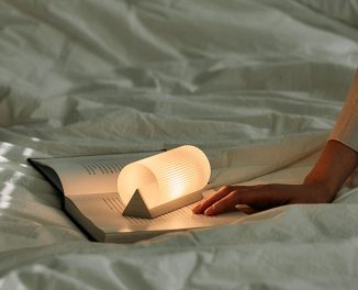 Stella Desk Lamp Casts Beautiful Waves of Light Through Acrylic Material